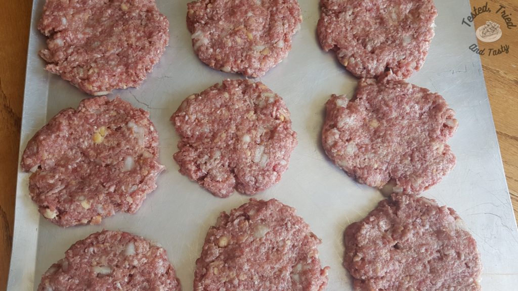 Flavorful homemade hamburgers ready for grilling.