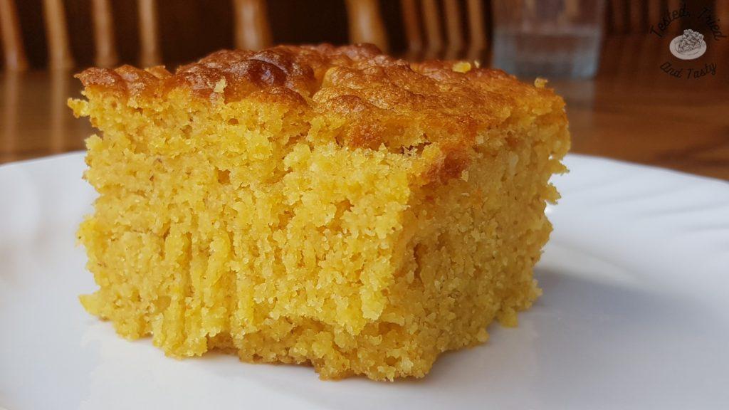 freshly baked buttermilk graham cornbread on a white plate