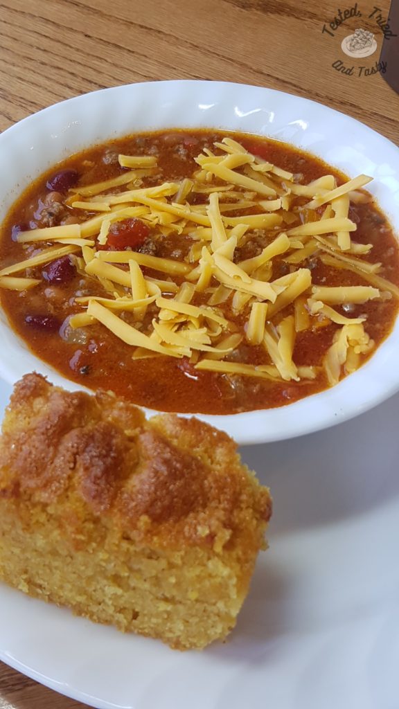 classic homemade chili recipe with cheese and cornbread.