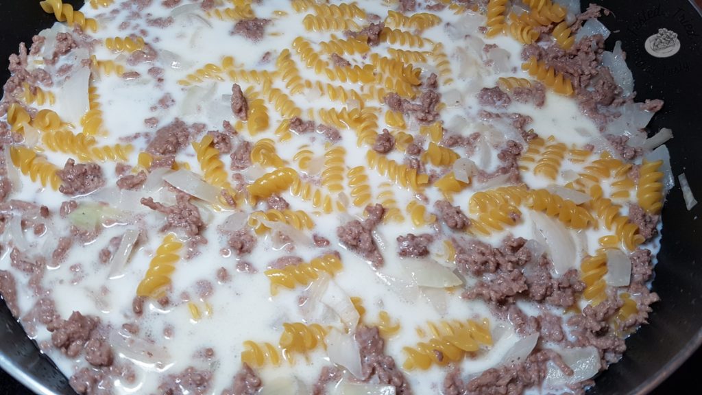 Hamburger helper with the milk, water, and pasta added.