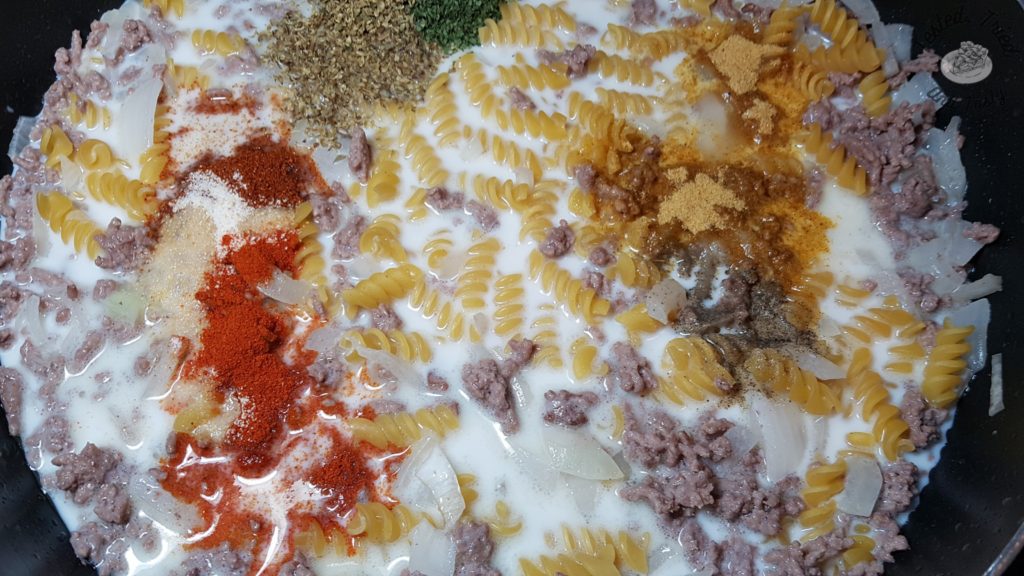 Spices added to meat, pasta, milk mixture