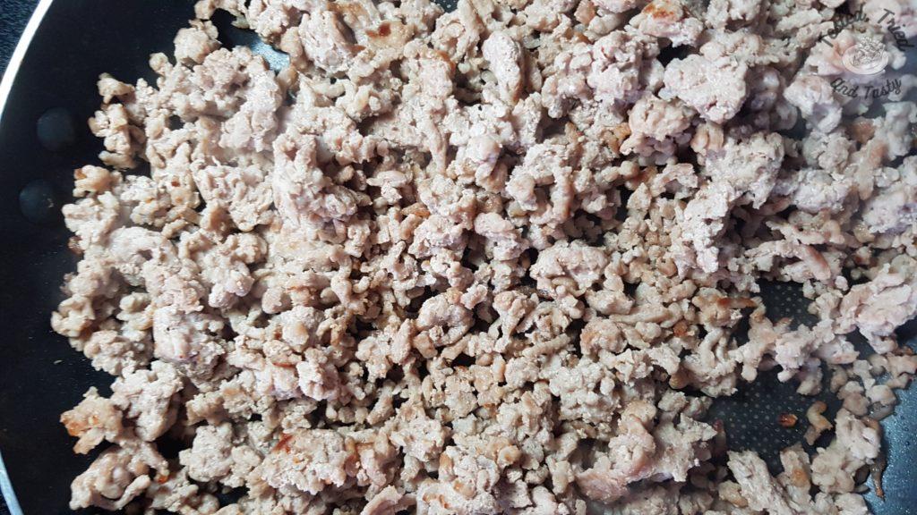 Cooked ground pork ofr noodle soup.