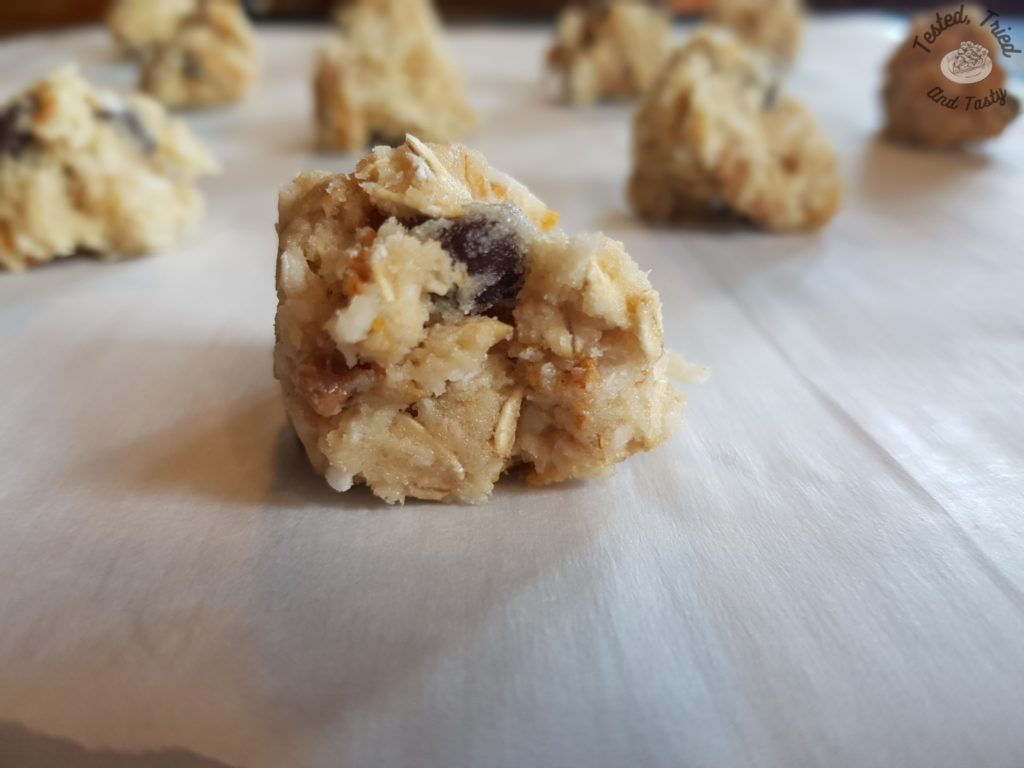 close up of a dough ball of cowboy kitchen sink cookies