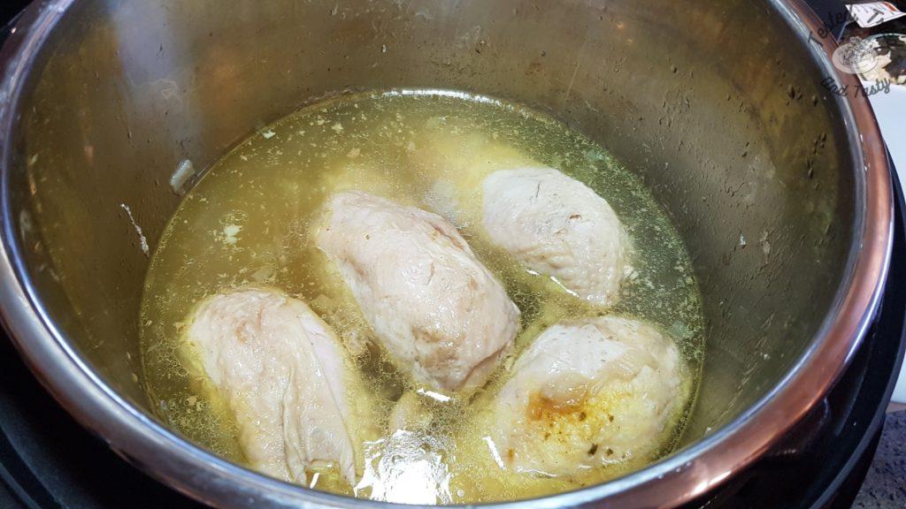 cooked chicken breasts in an instant pot