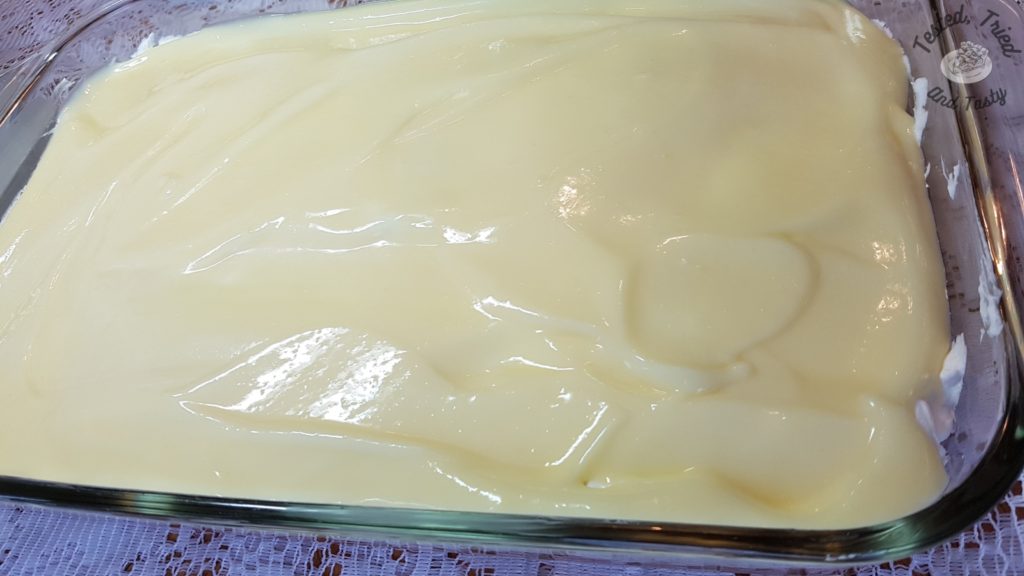 Vanilla pudding layer on top of Rhubarb Torte with Pudding.