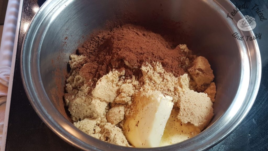Butter brown sugar and cocoa in a medium saucepan.