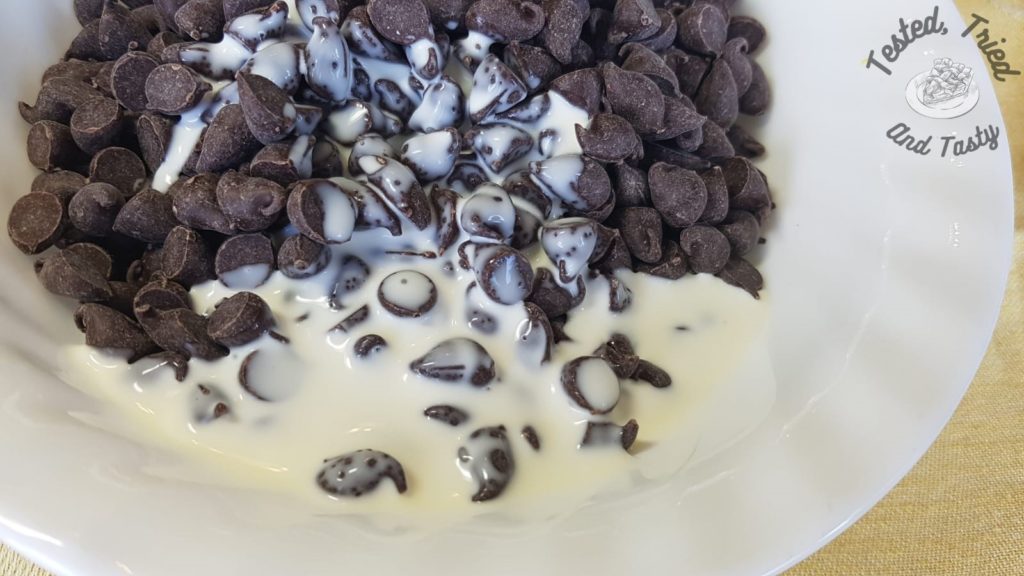 Chocolste chips and cream for the chocolate topping on frozen drumstick dessert.