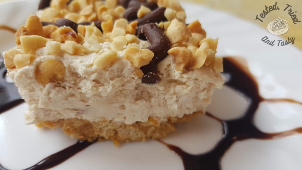 Frozen Drumstick Dessert on a white plate with a chocolate drizzle.