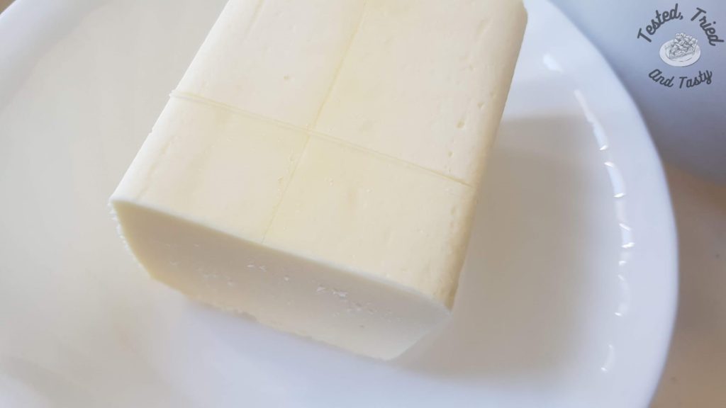butter in a white bowl.
