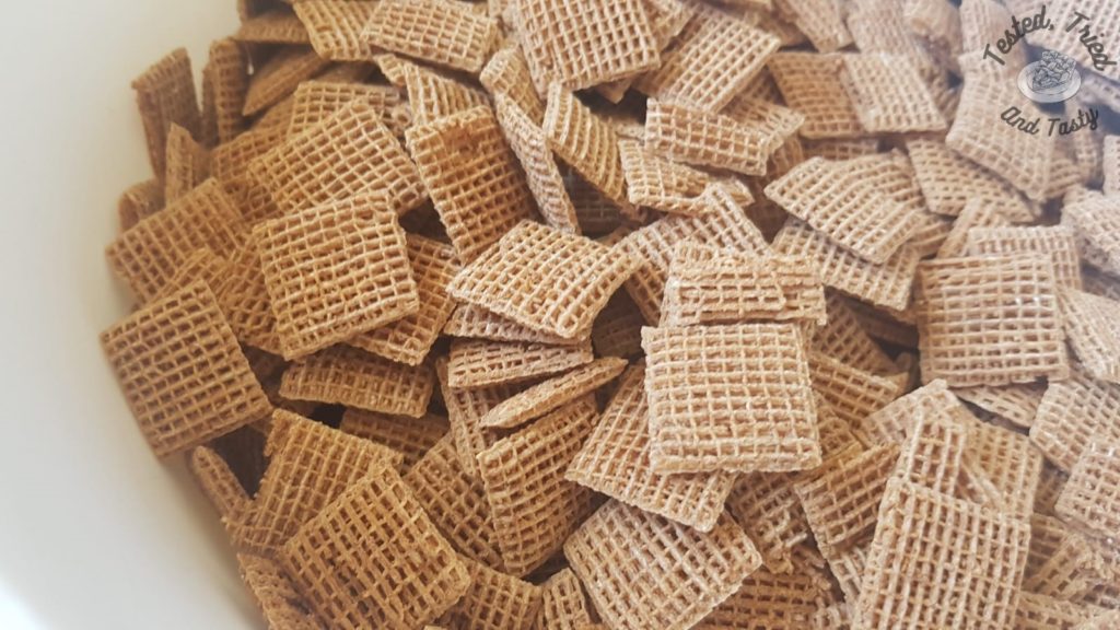 Shreddies in a white bowl.