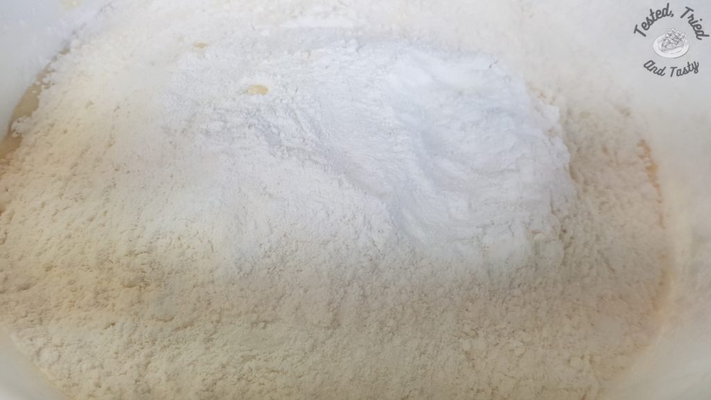 Dry ingredients added to the creamed butter mixture.