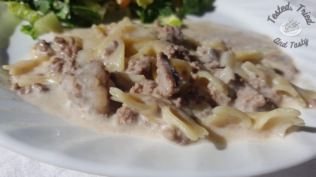 Hamburger helper stroganoff on a white plate.