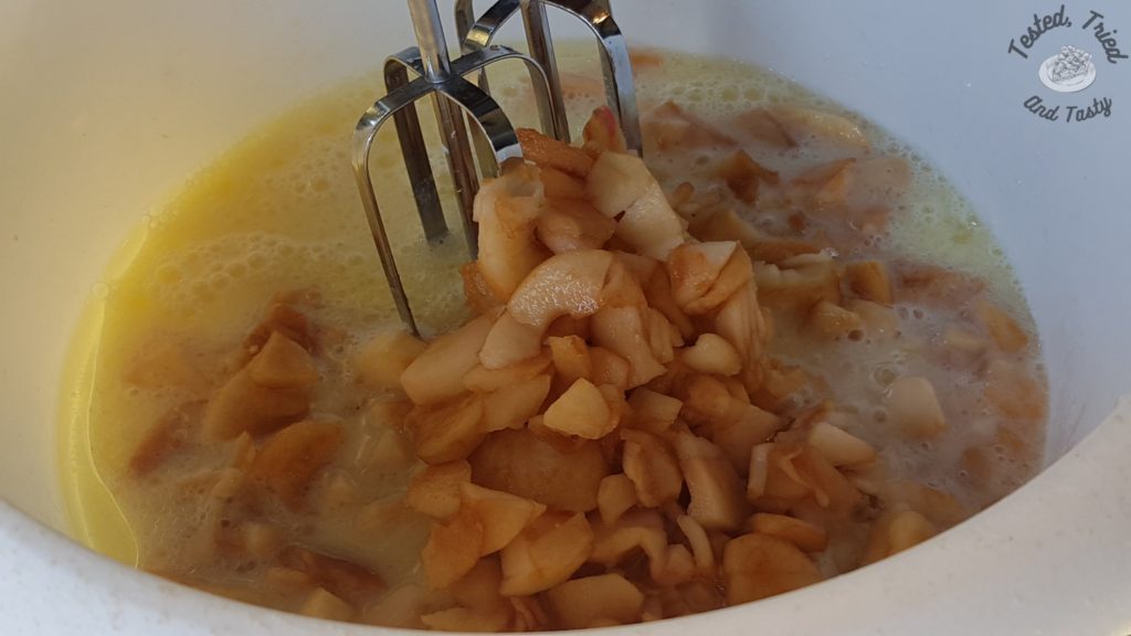 Apple pieces added to liquid ingredients.