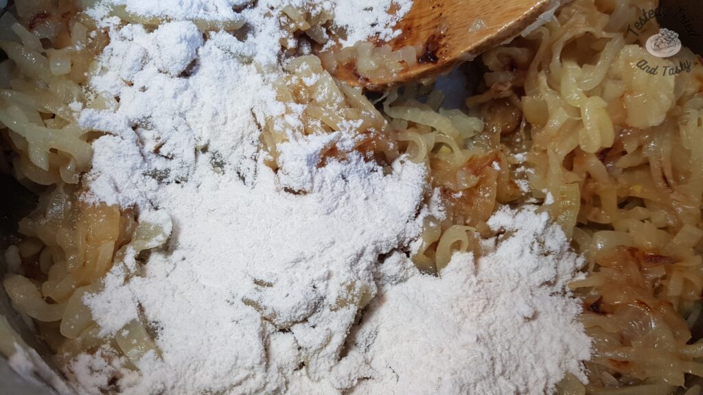 Flour salt and sugar added to caramelized onions.
