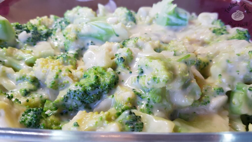 Broccoli covered in Mornay Sauce.