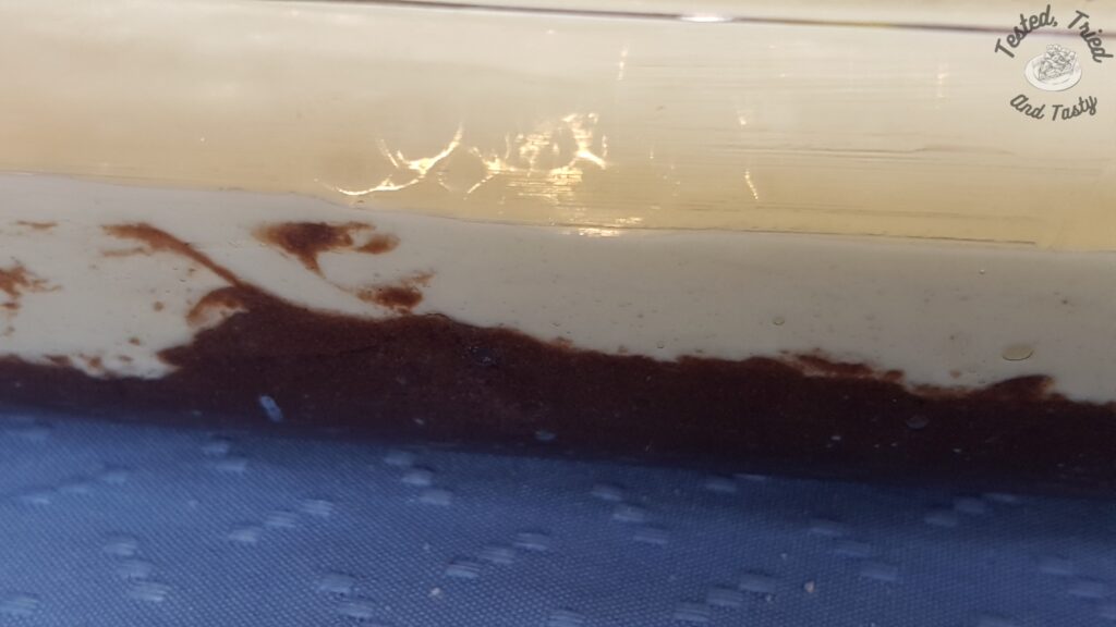 The two layers of black forest cheesecake cake.
