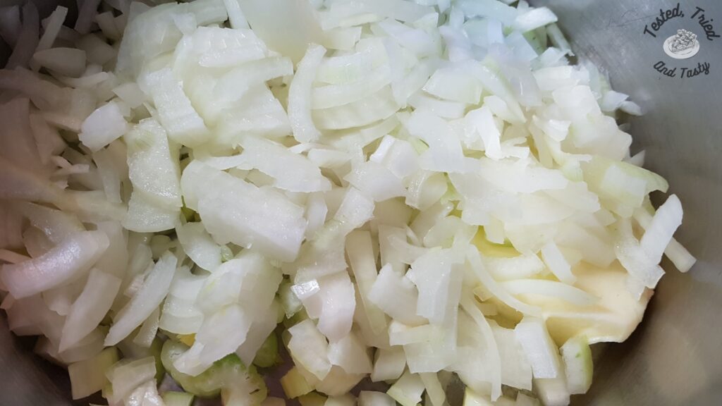 Onions and celery in the pan.