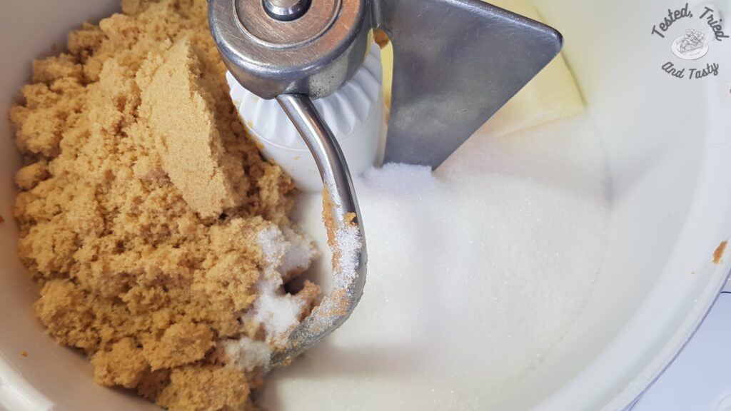 Butter brown sugar and white sugar in a bosch mixer.