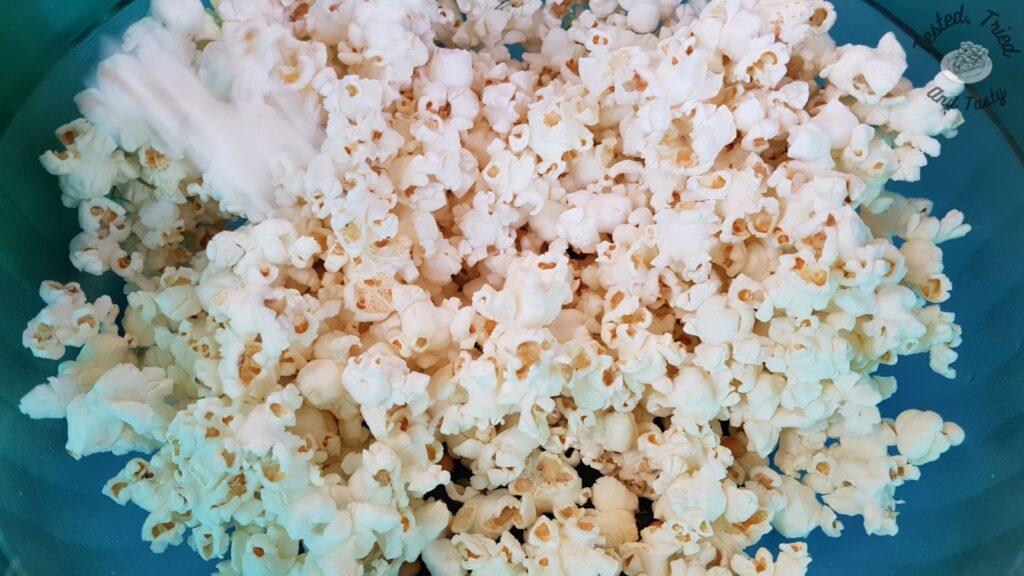 Popcorn in a green bowl.