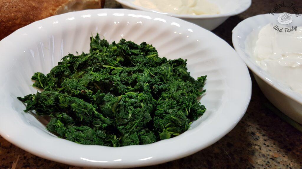 Frozen spinach once it has defrosted and been drained.