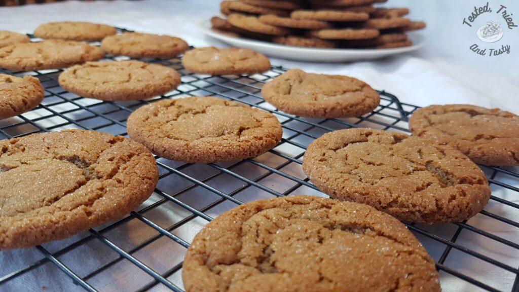 Ginger cookies on a wire cooling rack.