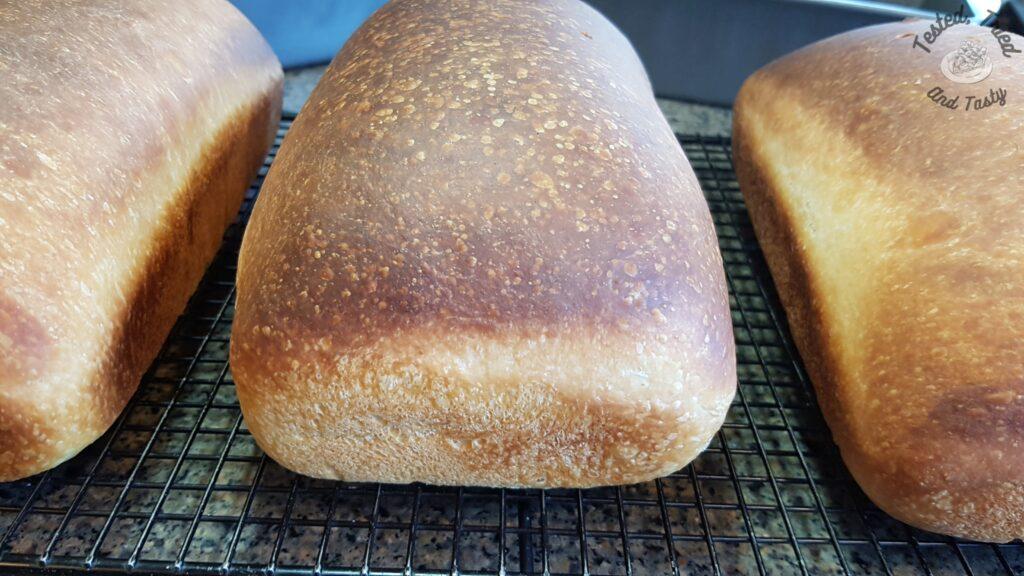 Sourdough bread for beginners on a wire cooling rack.