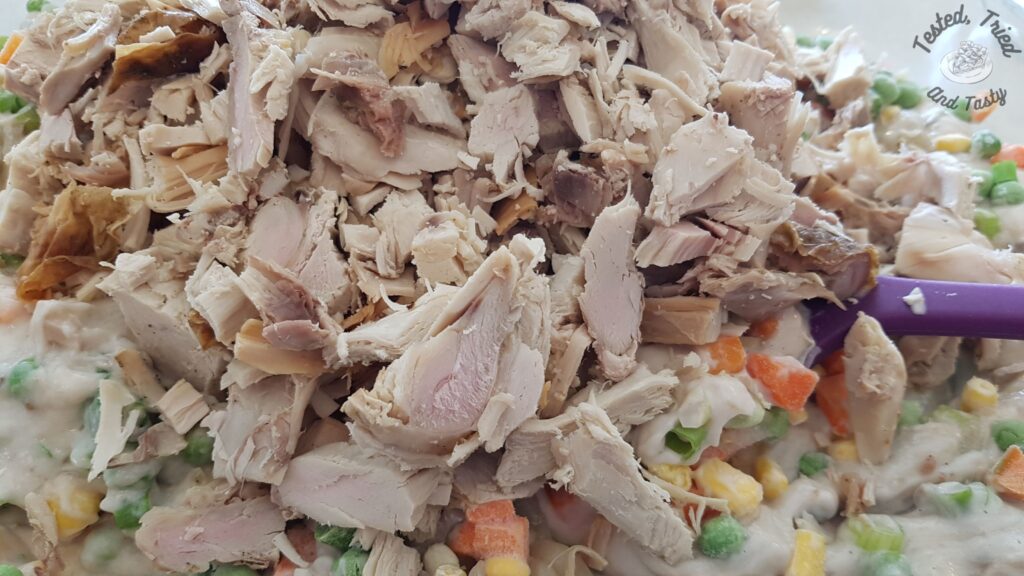 Turkey added to the gravy mixture for leftover turkey casserole.
