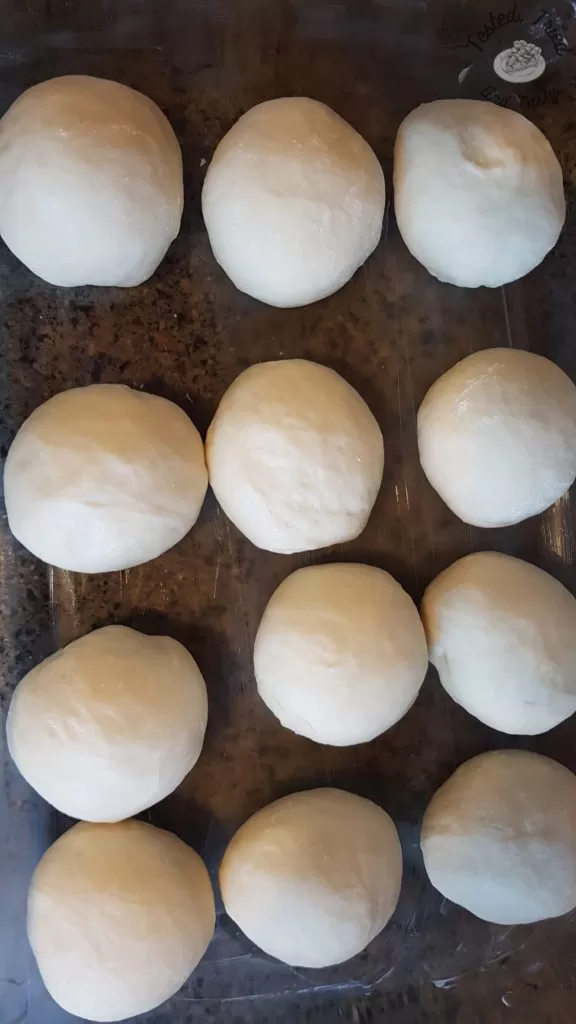 light and fluffy homemade honey buns ready for rising.