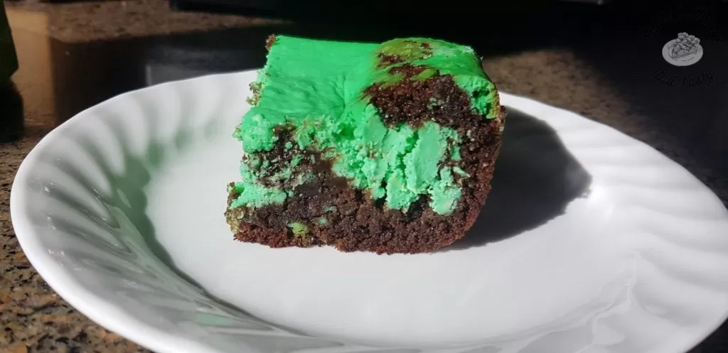 Mint Chocolate Cheesecake Cake on a white plate.