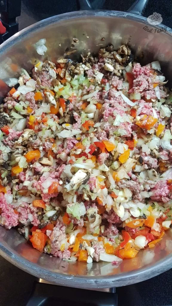 vegetables and meat cooking for classic homemade chili recipe.