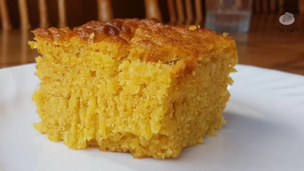 freshly baked buttermilk graham cornbread on a white plate