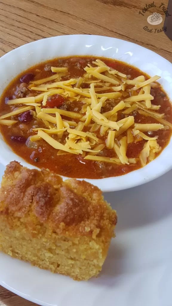classic homemade chili recipe with cheese and cornbread.