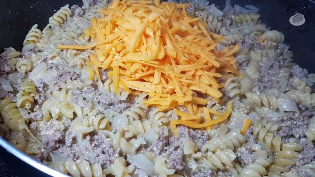 Cheddar Cheese added to homemade hamburger helper.
