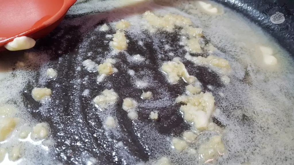 Butter melted with garlic in large saucepan.