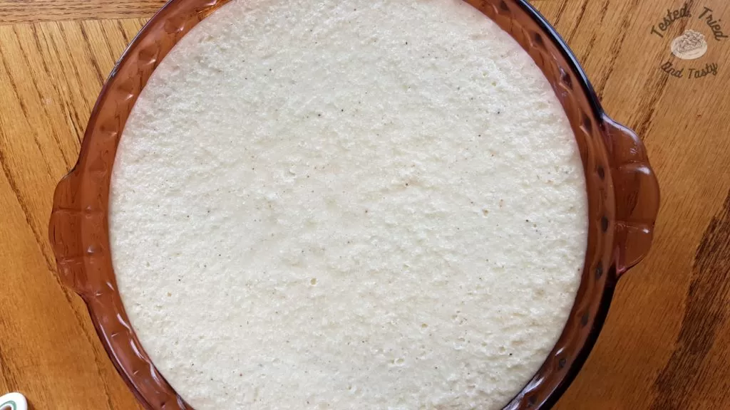 Impossible Pie in a glass baking pan on a wooden table