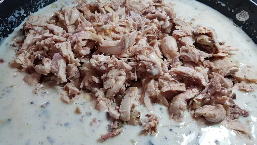 Chicken added to the mornay sauce for creamy chicken lasagna.