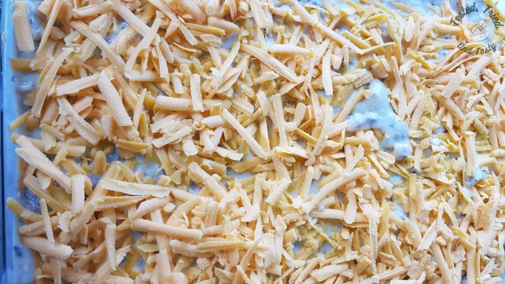 Cheese on top of chicken lasagna