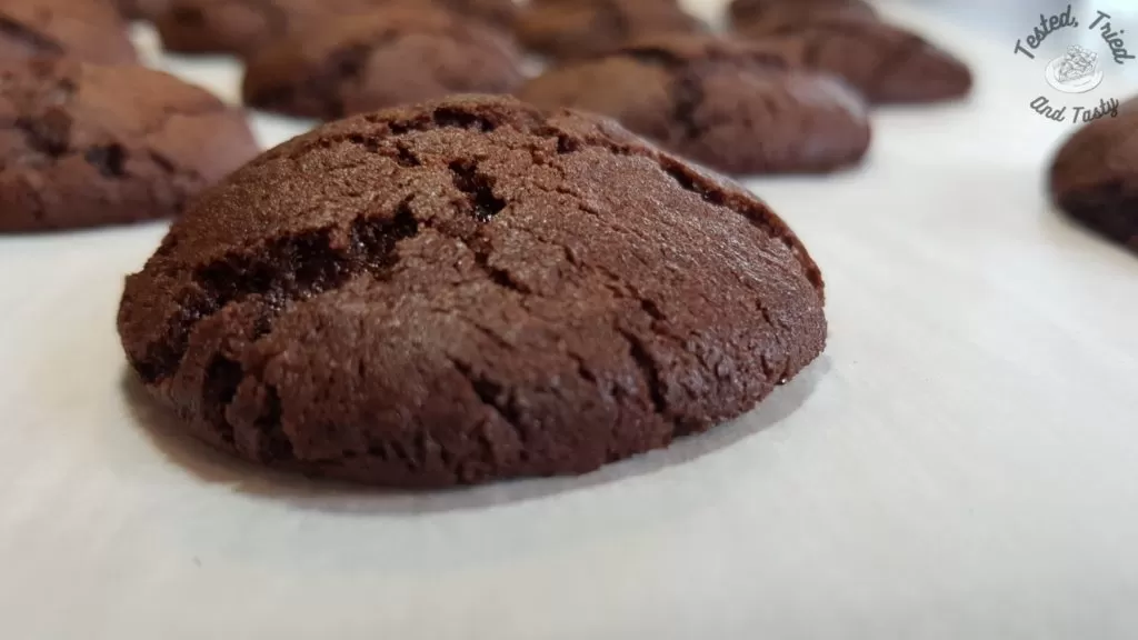 homemade oreo cookies on parchment paper.