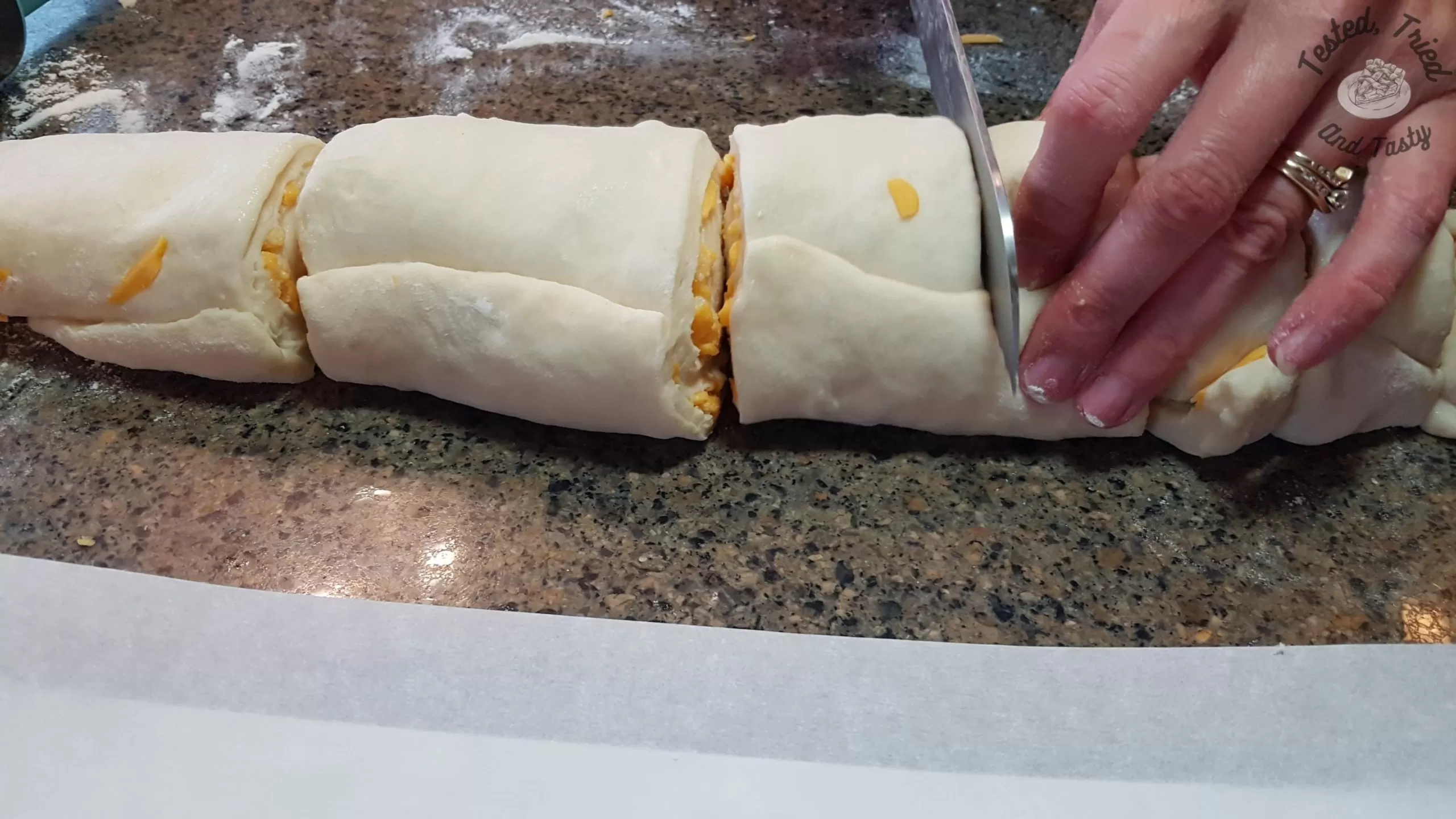 cutting the dough for garlic cheese buns