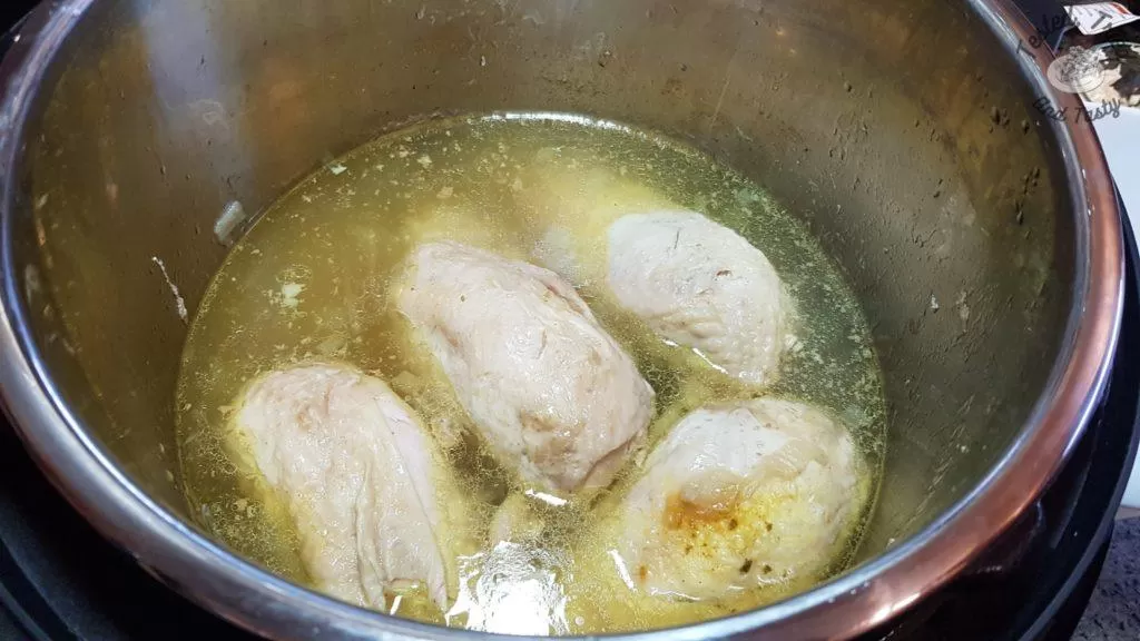cooked chicken breasts in an instant pot