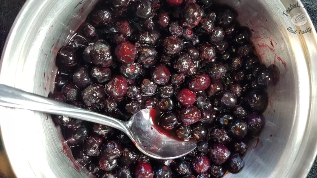 blueberries with sugar in a small saucepan.