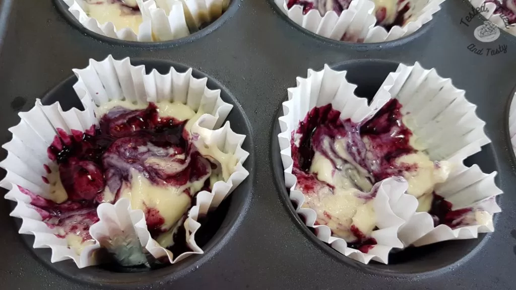 vanilla batter with a blueberry syrup swirl