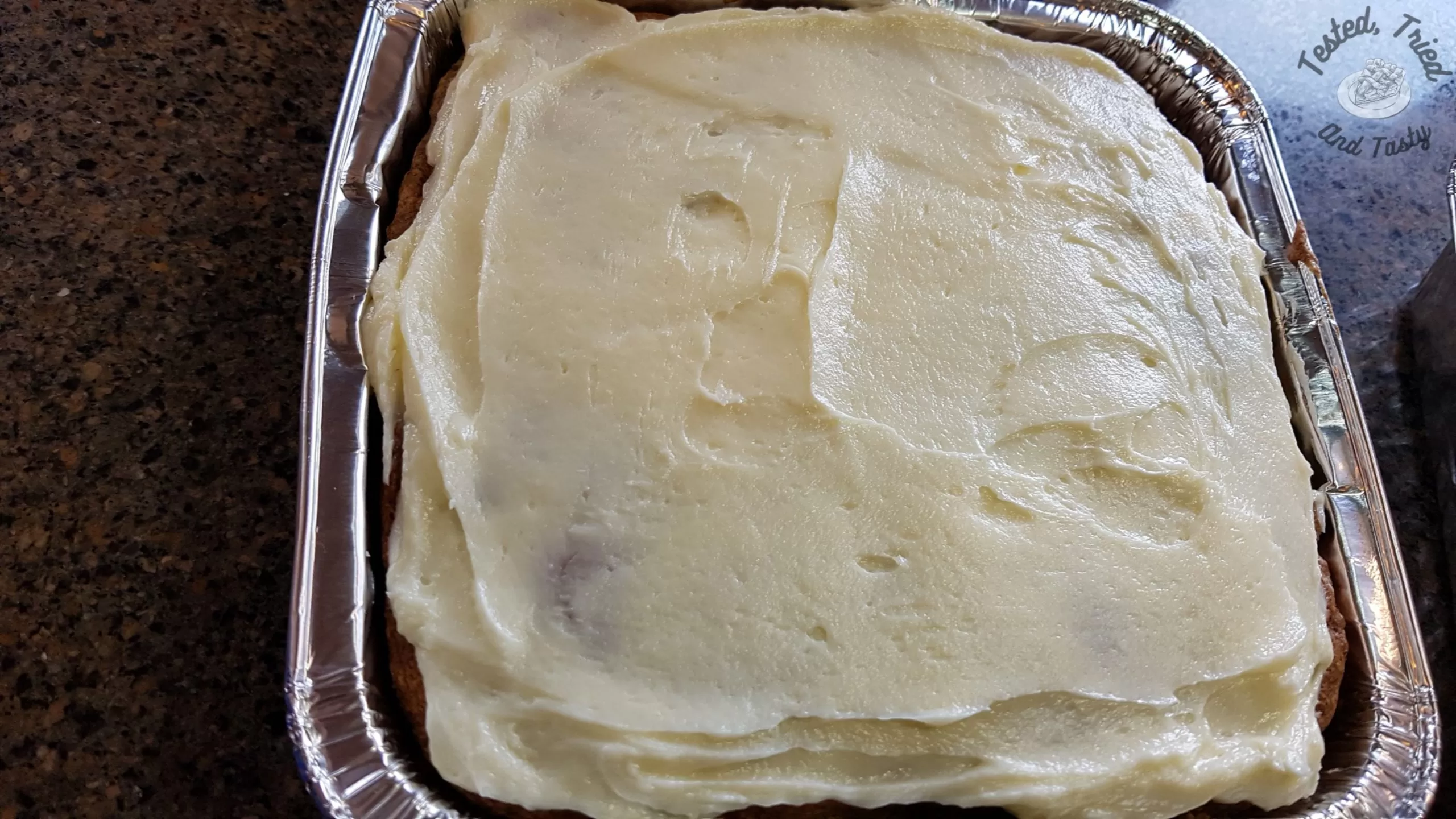 moist and easy carrot cake with almond cream cheese icing