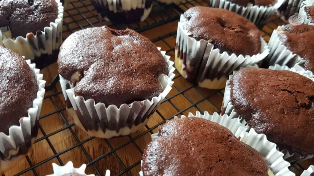 marble cupcakes on a wire cooling rack
