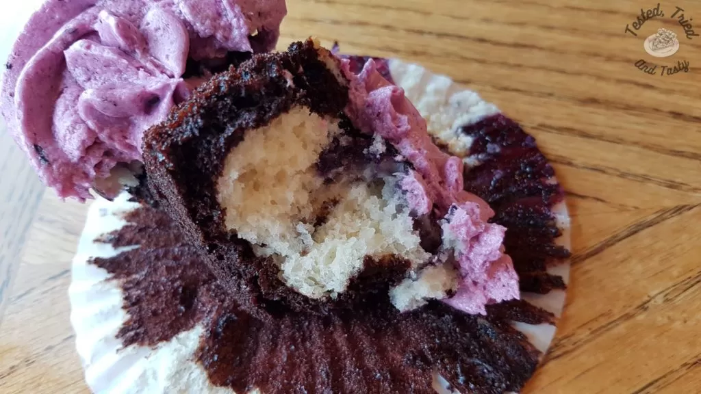blueberry buttercream marble cupcake broke in half