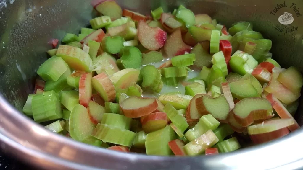 Rhubarb added to the sugar, cornstarch, water mixture in a small saucepan.