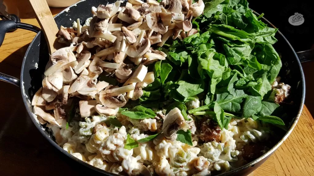 Spinach and mushrooms on Garlic Sausage and Spinach Alfredo.