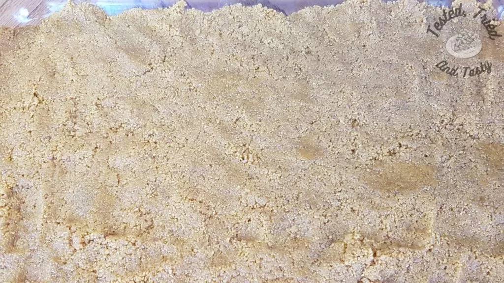 Graham wafer crust with peanut butter.