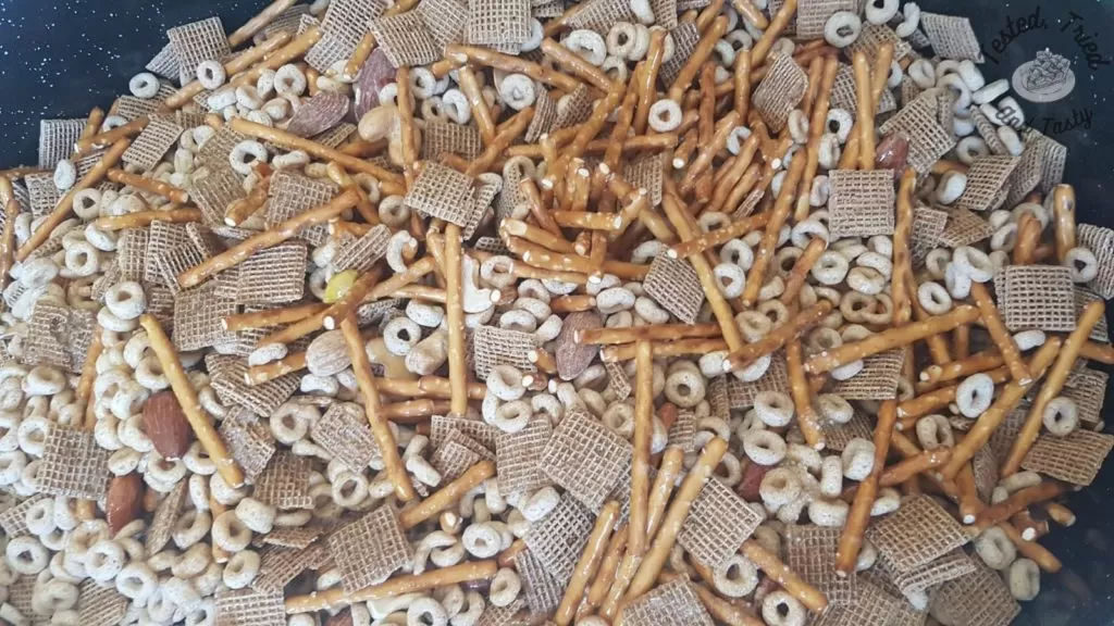 Homemade Nuts and Bolts recipe in a large roaster.