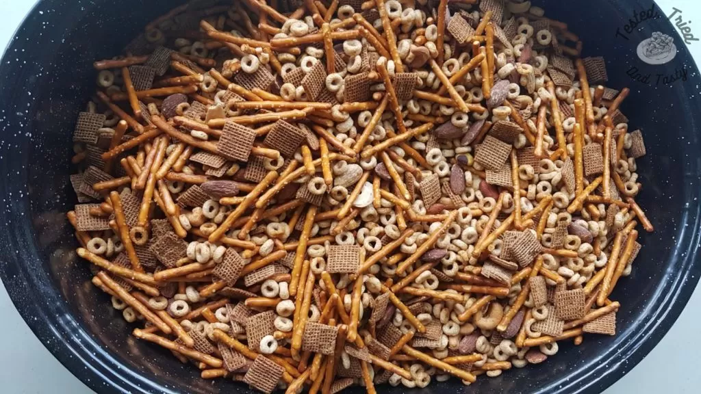 Homemade Nuts and Bolts recipe finished in a large roaster.